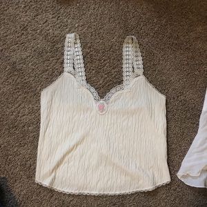“Sleep Solations” White silky top (1) $13. “A.BYER” White flowy lace top (2) $13